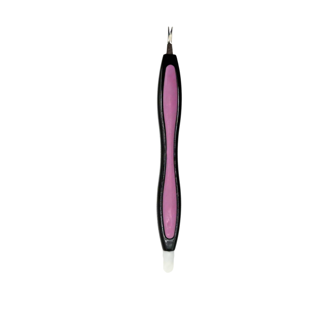 A cuticle knife hoof stick combination with a black handle featuring a pink center panel, topped with a metal spade-like blade and finished with a white tip at the bottom, shown on a plain white background.