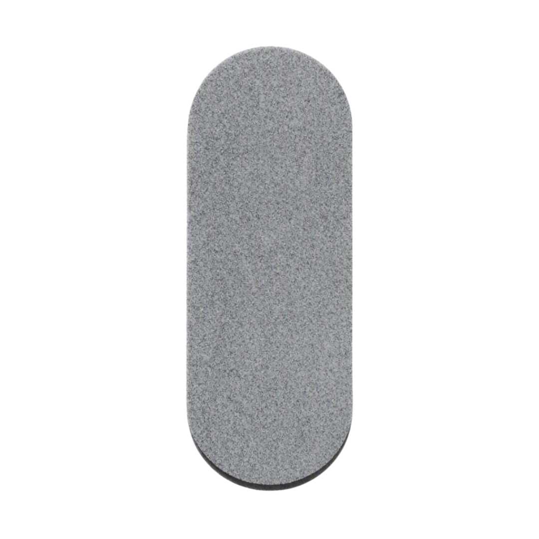 A gray, textured oval-shaped sanding or sharpening stone with rounded corners, shown vertically against a plain white background.