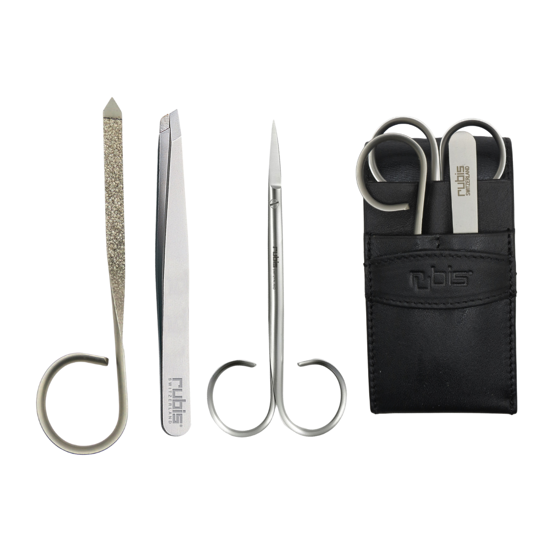 A 4-piece set of Rubis manicure and pedicure tools consisting of metal nail file, slanted tweezer and a sharp pointed scissor and a black leather storage pouch. 